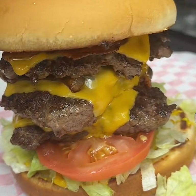 Triple Burger: A Mouthwatering Feast of Juicy Patties